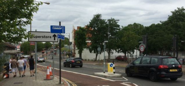 A huge motorway-size sign adds to street clutter at Charlton Church Lane