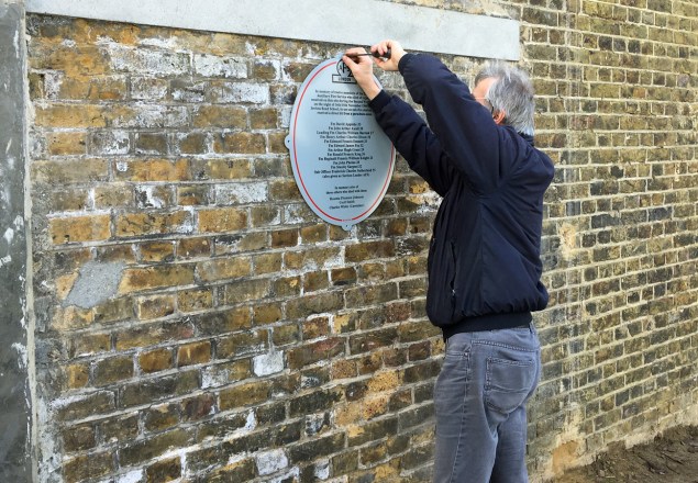 The plaque is erected in the playground