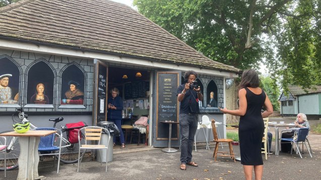 BBC London cameraman and reporter outside cafe