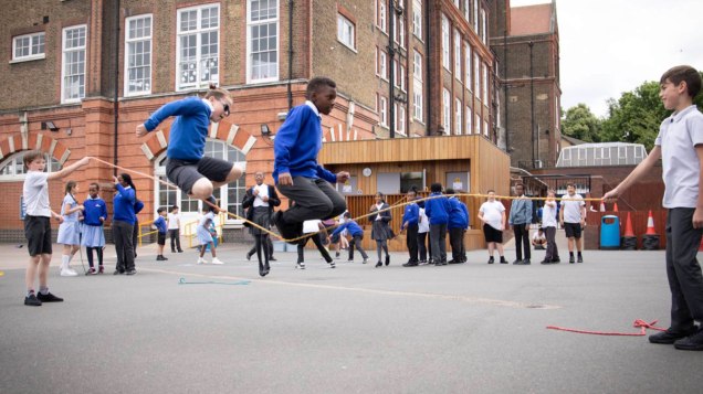 Children in the playground at Windrush primary school