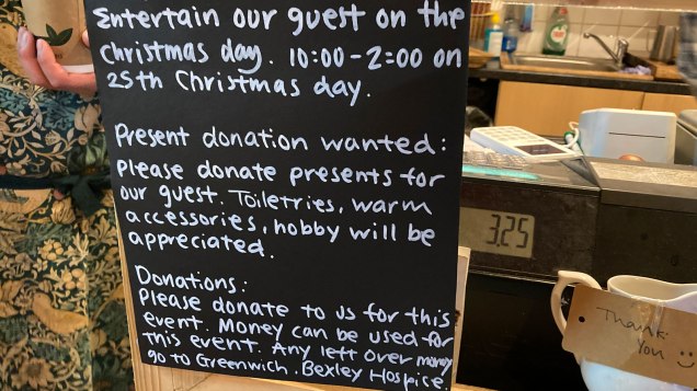 Old Cottage Cafe sign appealing for donations